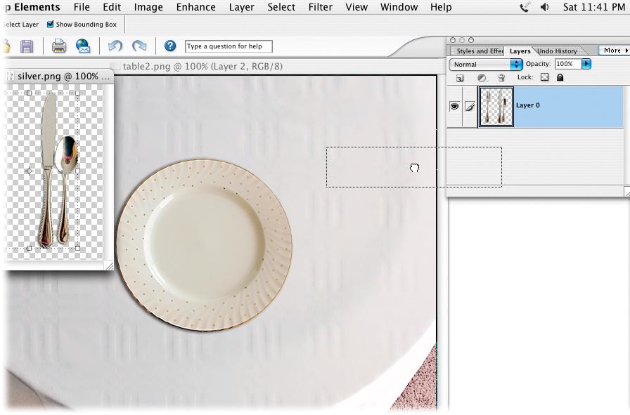 This figure shows how to move objects from one photo to another. Here, the goal is to get the silverware from photo A (whose Layers palette is visible) onto the tablecloth in photo B (whose image is visible). You always drag from the Layers palette onto a photo window when you combine parts of different images into a composite. (If you try to drag from a photo to a photo, it won't work.) You can use the Move tool to adjust your object's placement once you've dropped it into the image.