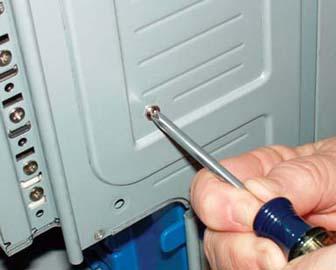 Drive the two remaining screws to secure the removable drive bay from the side
