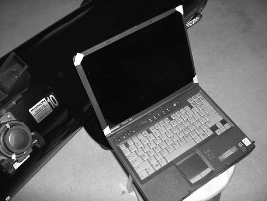 Our Compaq Armada notebook, equipped for nighttime use