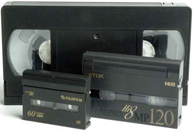 The various sizes of tapes that today’s camcorders can accept differ in size, picture quality, and cost. For both home and prosumer filming, the standard-size VHS cassette (back) is nearly extinct. 8 mm and Hi-8 cassettes (right) are extremely popular among people who don’t have a computer to edit footage, and are very inexpensive. MiniDV tapes (left), like the ones required by most DV camcorders, are more expensive—but the enormous quality improvement makes them worth every penny.
