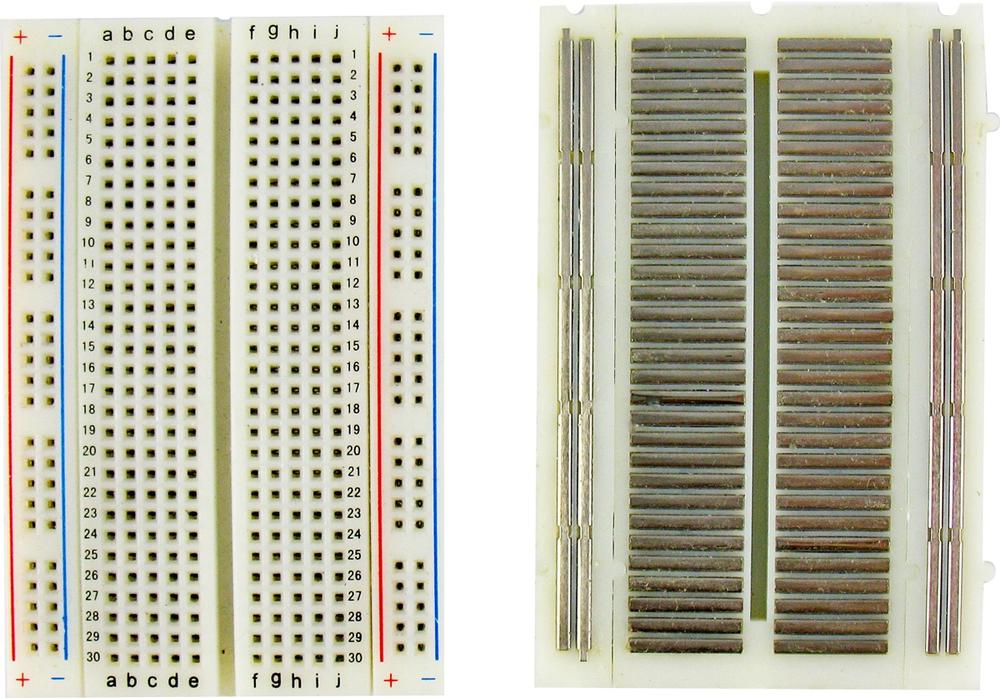 Breadboard front and back, showing metal clips
