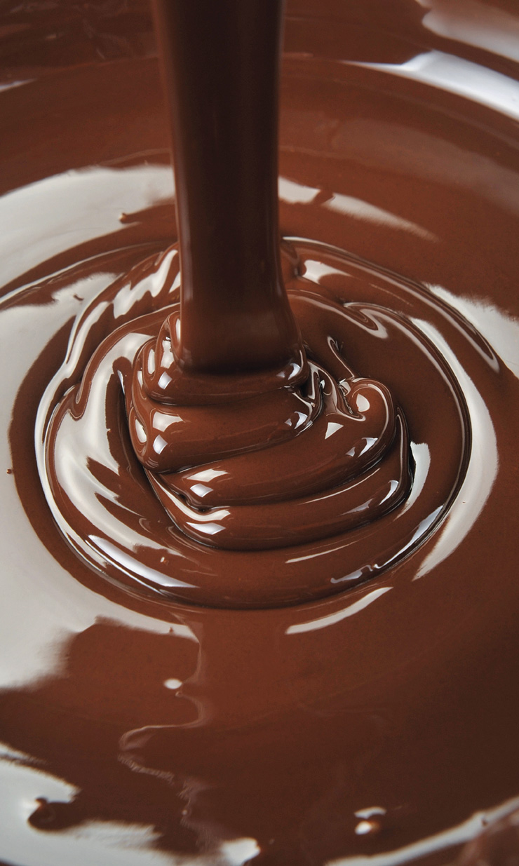 A photo shows chocolate sauce being poured from above.