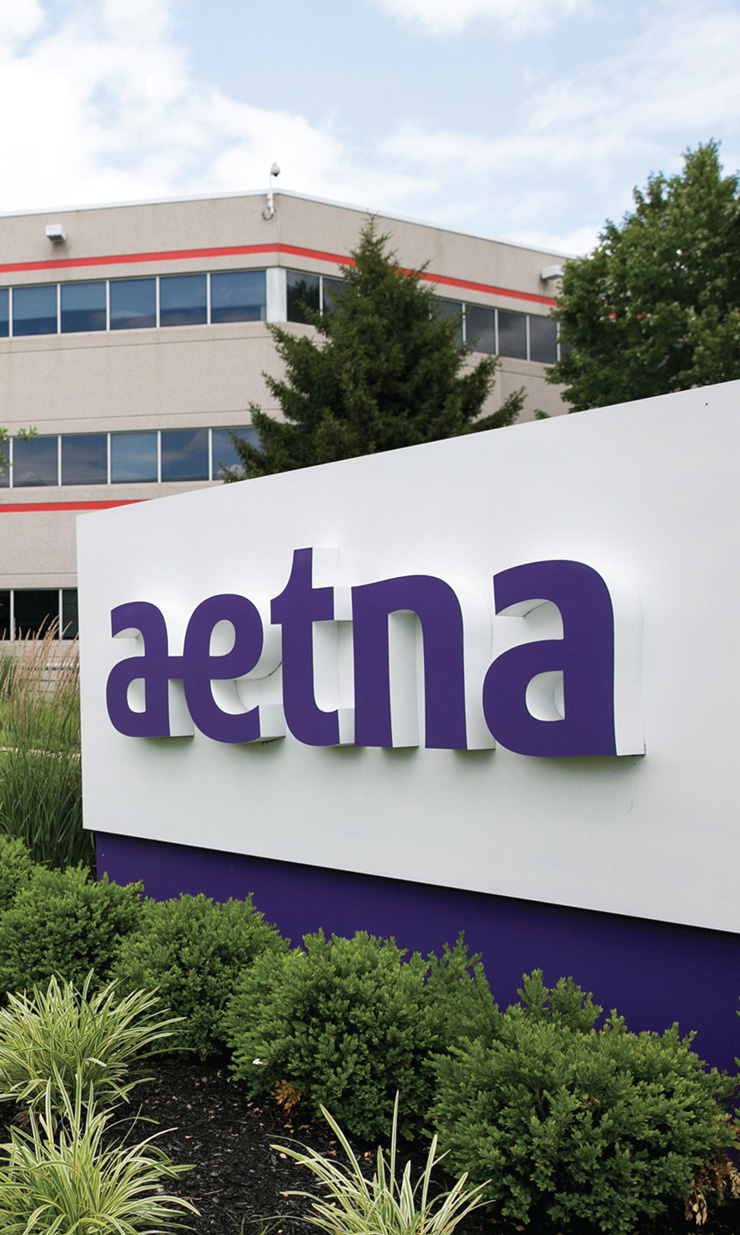 A photo of the exterior of an Aetna insurance office.