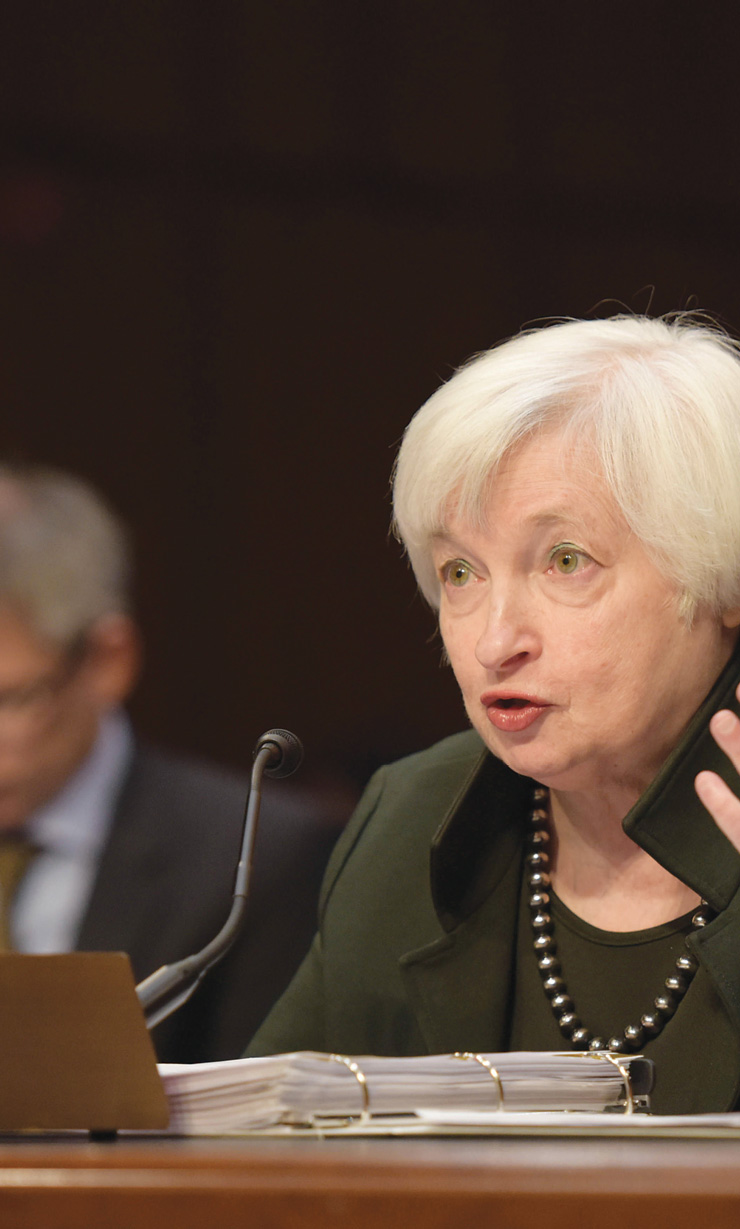 A photo of Janet Yellen, former chair of the Federal Reserve, speecking at a conference.