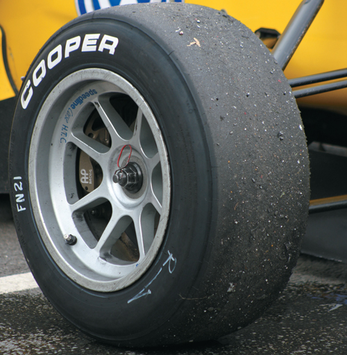 A photo shows a Cooper tire on a racing car.