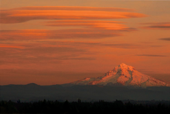 Lenticular clouds over Mount Hood in Oregon fill the sky after sunset. Exposure: ISO 640, f/8, 1/250 second, −1EV.