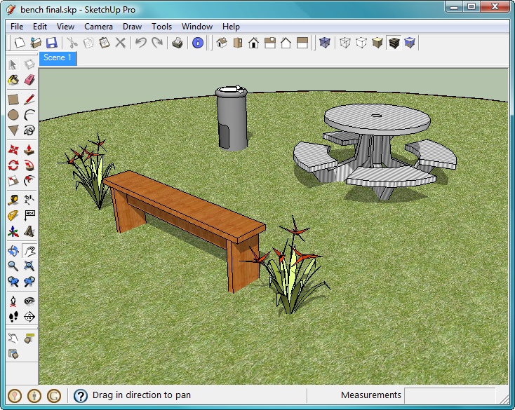 You can dress up any SketchUp model by adding prebuilt components. This scene includes plants, a water fountain, a picnic table, and a bench from the Landscape components group.