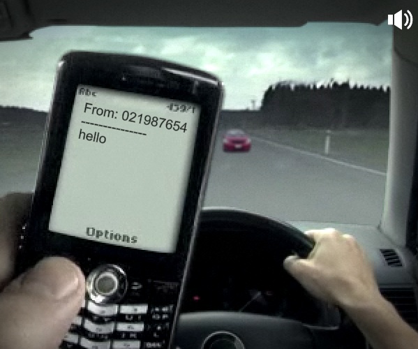 The distracted driver receives the text message