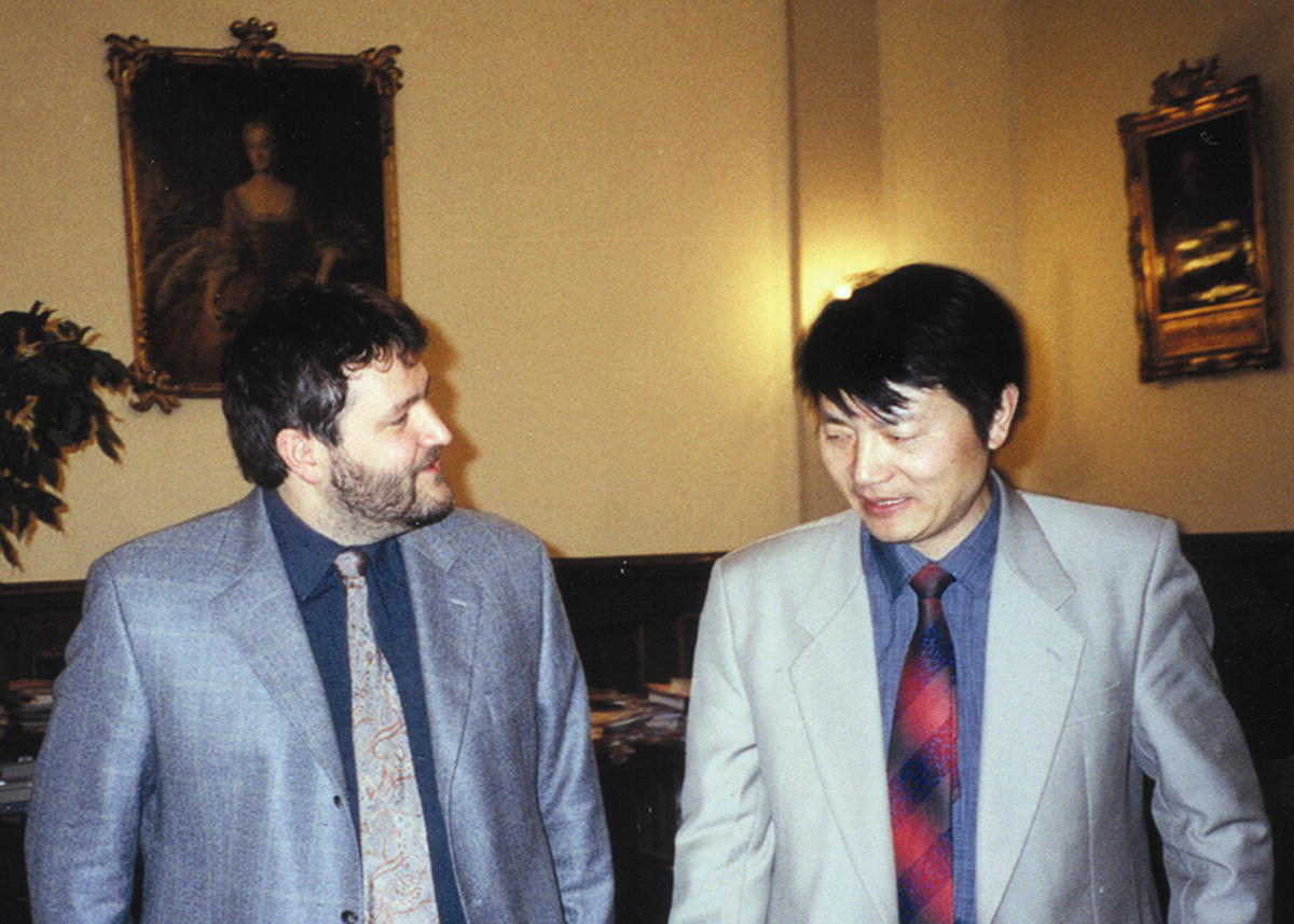 Photo of Professor Xiaoting Rui (right) standing beside Professor Peter Eberhard (left).