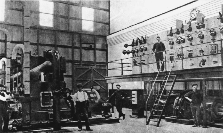 Picture taken sometime back in the year 1908 in New Zealand. Five persons were seen posing for the photograph taken inside the Freeman's Bay power station.