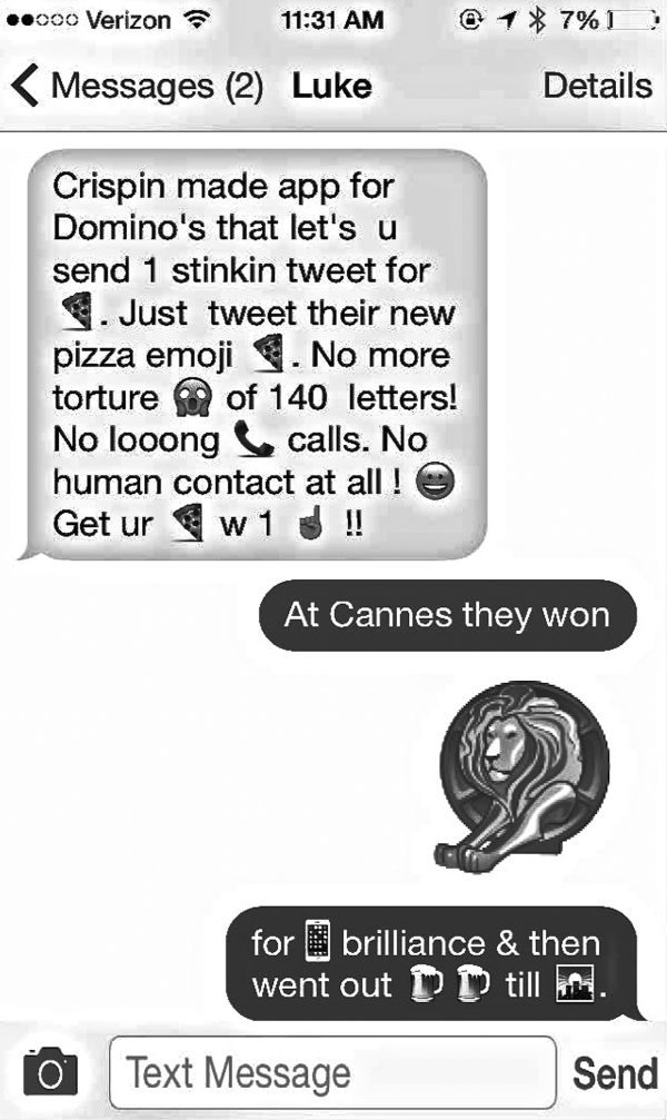 Figure representing a mobile phone screen depicting a message from Domino's for ordering pizza using their new pizza emojis.
