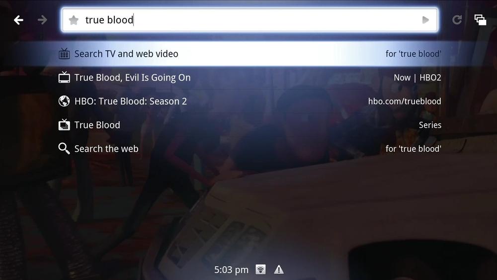 The QSB shows a blend of search results from traditional TV and the web