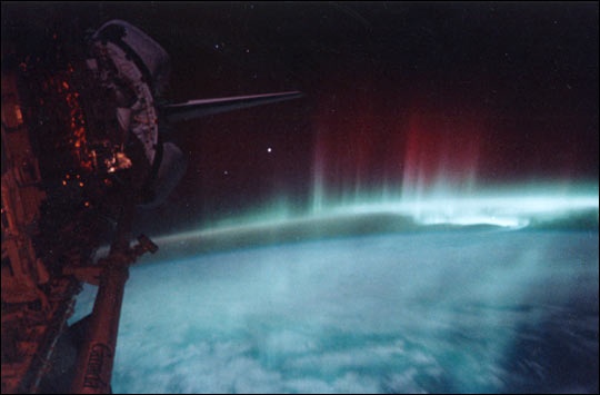 Space is beautiful, hostile, and survivable.  Image of an aurora from the space shuttle, courtesy of NASA.