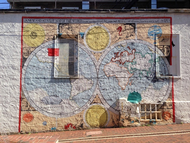 A map, with people inside it. In this case, on the side of a favorite pizza joint in; Phoenixville, PAPhoto by author.