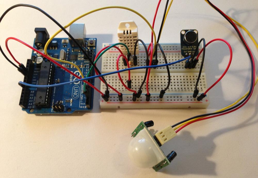 The Arduino and breadboarded DHT-22, PIR, and microphone