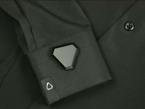 Notch activity tracker attached seamlessly to a jacket sleeve