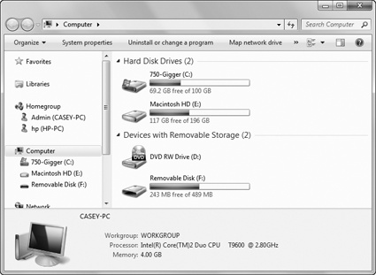 The Computer window lists your PC’s drives—hard drives, CD drives, USB flash drives, and so on; you may see networked drives listed here, too. This computer has two hard drives, a USB flash drive, and a CD-ROM drive. (If there’s a disk in the CD drive, you see its name, not just its drive letter.) When you select a disk icon, the Details pane (if visible) shows its capacity and amount of free space (bottom).