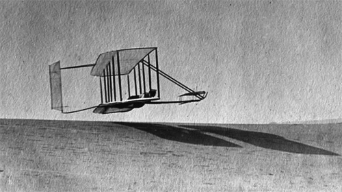 An early Wright brothers’ glider on a test run at the famed Kill Devil Hills.