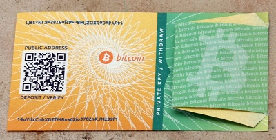 The bitcoinpaperwallet.com paper wallet with the private key concealed.