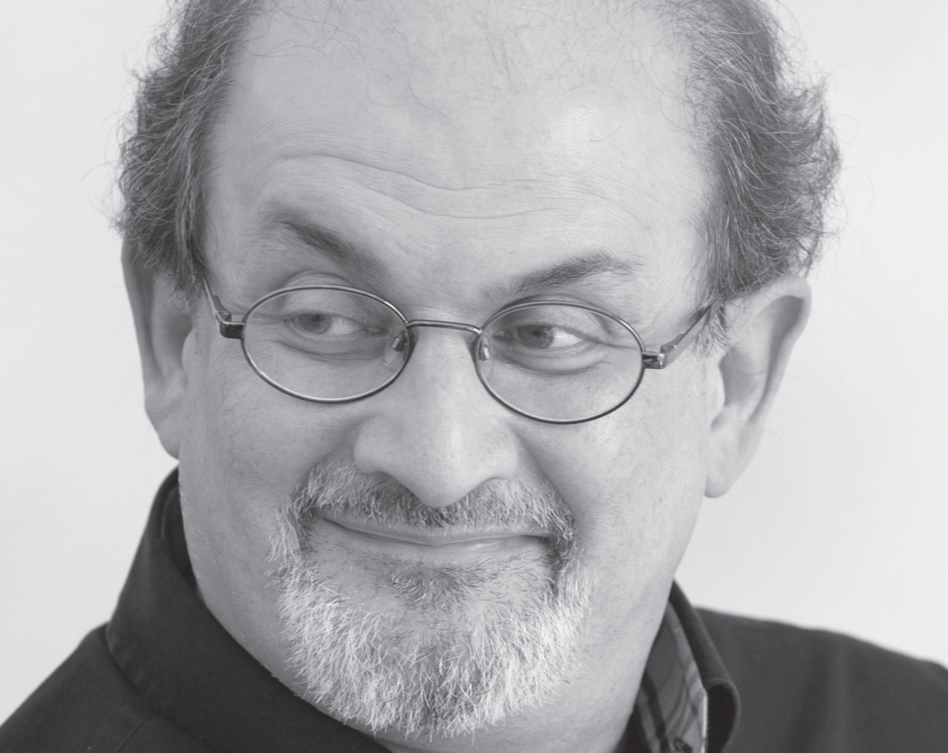 Photo of a person wearing eye glasses and smiling.