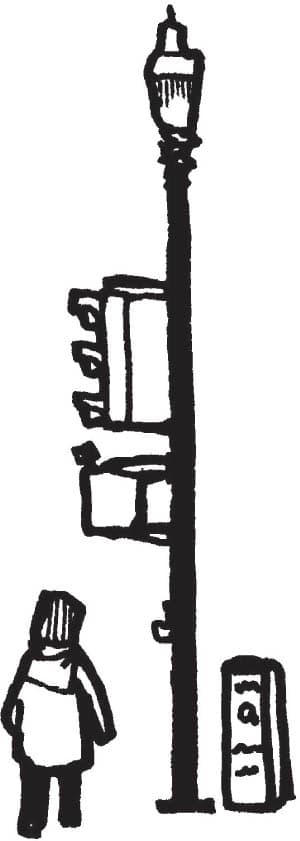 A simple sketch of a person standing near a streetlight with traffic signals and a small utility box.
