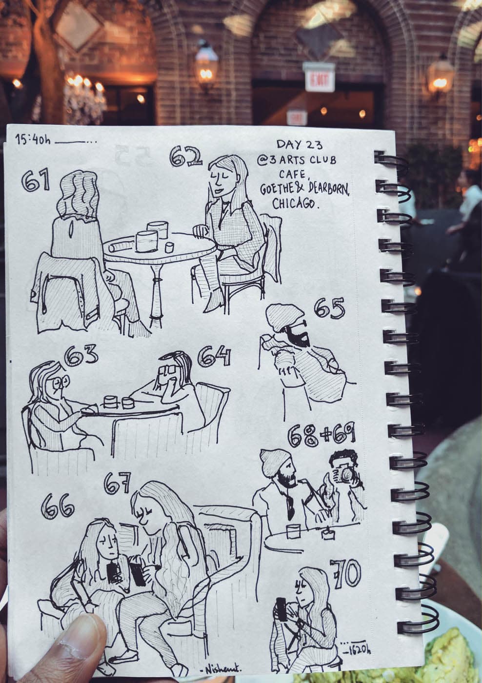 A sketchbook page featuring quick ink drawings of people at a café, with numbered sketches and accompanying text describing the location and context.