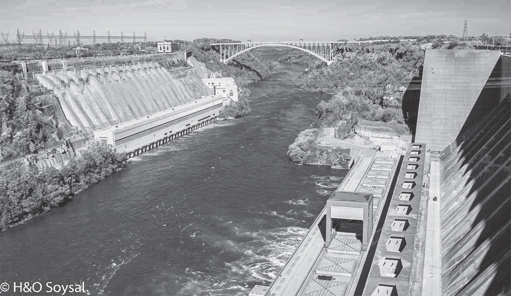 Photo depicts the Canadian and American hydroelectric power plants in Niagara Falls.