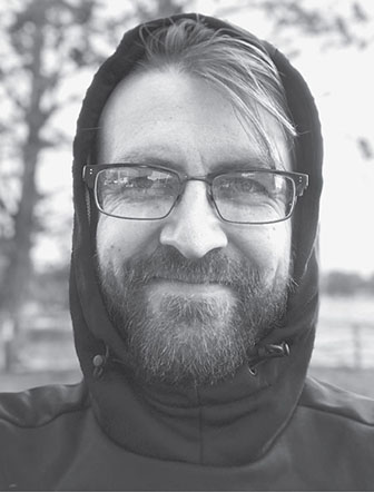 Closeup image of "Jared Folkins," who currently operates red teams for ThreatHound.com, blue teams for Bend La Pine Schools, and breaks down software while building up people at OpsecEdu.com.