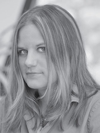 Closeup image of the serial entrepreneur, penetration tester, security researcher, speaker, trainer, and author "Georgia Weidman."