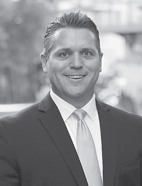 Closeup image of the vice president at Aon Cyber Solutions "Lee Carsten."