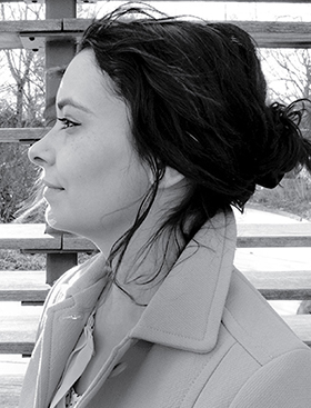 Side image of the security engineer at Spotify “Kelly Lum.”