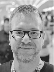 Closeup image of the member of Salesforce's security team “James Arlen.” 