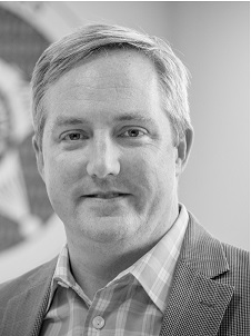 Closeup image of the teaching professor of information technology, analytics and operations at the University of Notre Dame’s Mendoza College of Business “Mike Chapple.”