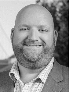 Closeup image of the veteran cybersecurity executive “Andrew Hay.”