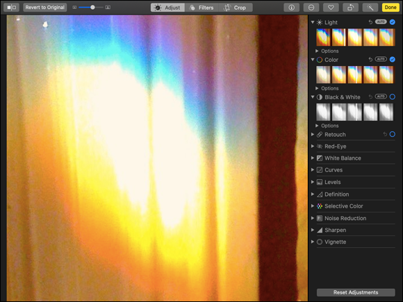Snapshot of the MacBook includes Photos, a powerful but easy‐to‐use application for managing, improving, and enjoying your photos.
