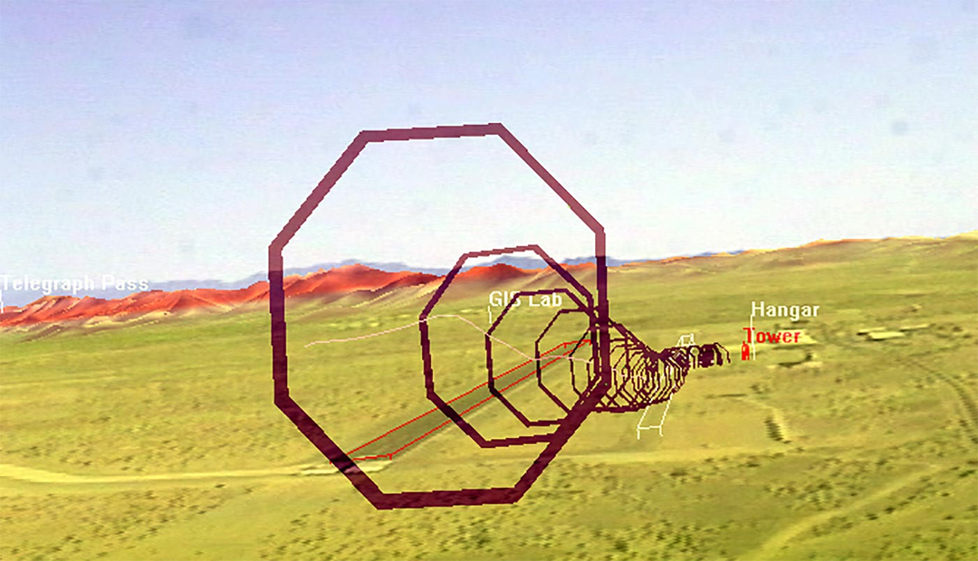Landform video with map overlays showing landmarks and other indicators during helicopter flight at Yuma Proving Ground.﻿