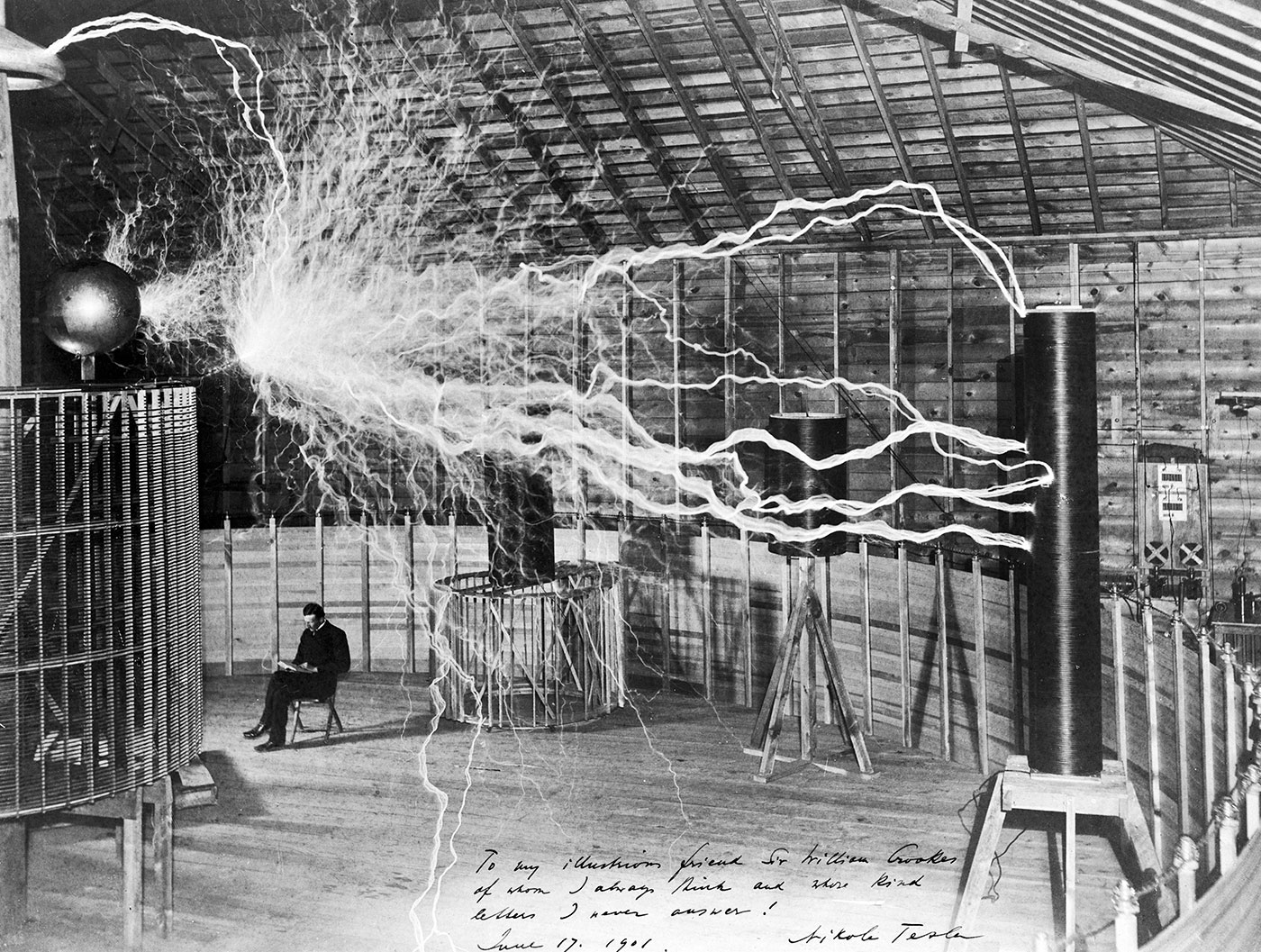 Nikola Tesla, with his equipment